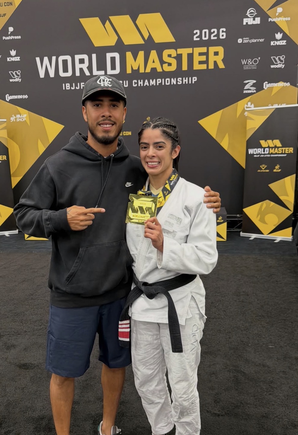 Elementum athlete holding a gold medal at the IBJJF World Master 2026